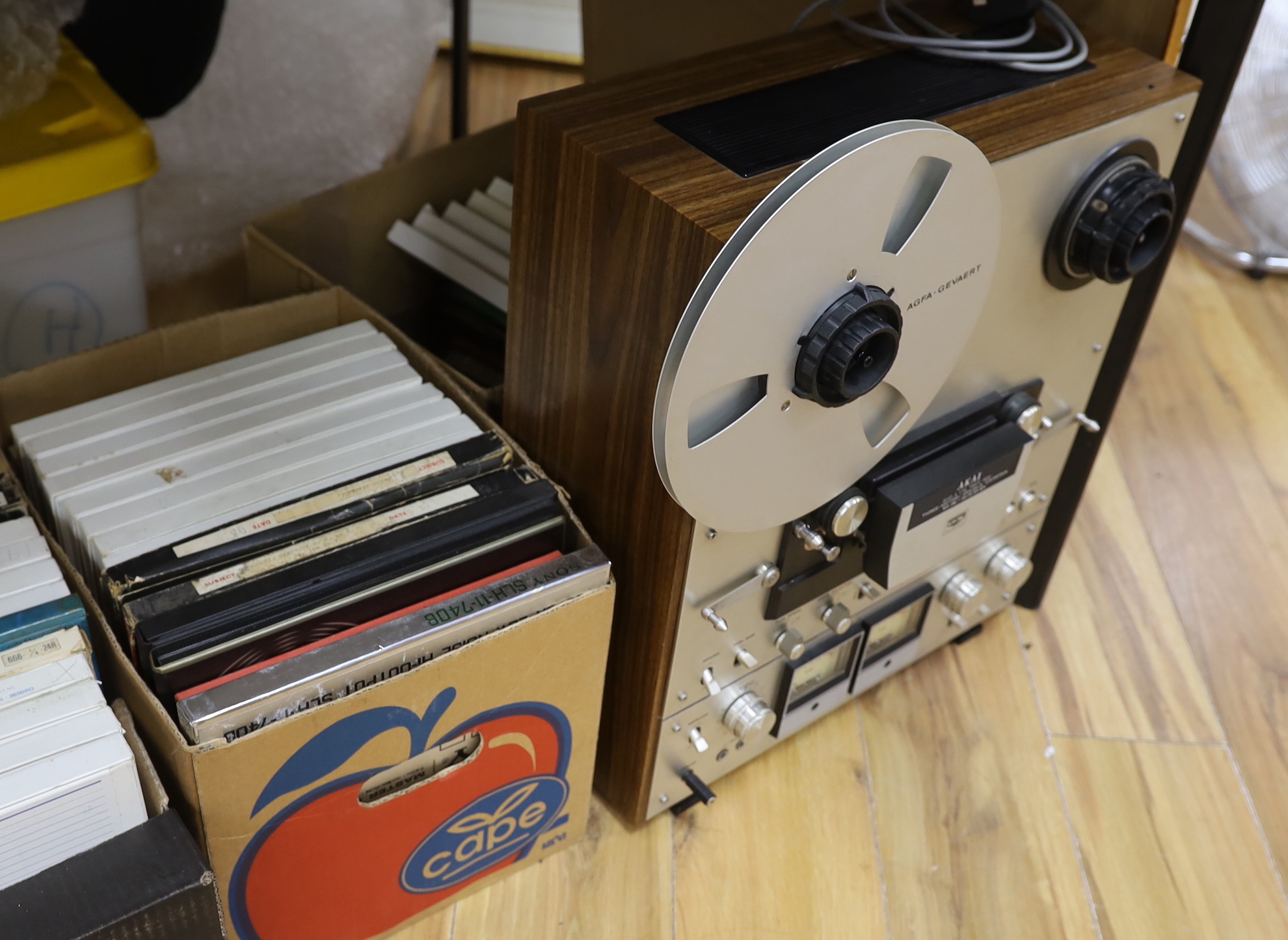 An Akai GX650D reel to reel tape recorder and C.150 10in. and 7in. reel to reel tapes